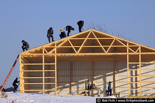 Wisconsin;teamwork;snow;men;country;Amish;agriculture;agricultural scene;barn raising;blue sky;barn