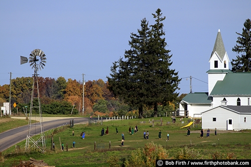 agricultural scene;agriculture;Amish;blue sky;children;church;country;fall;kids;one room schoolhouse;playground;road;school;schoolyard;WI;windmill;Wisconsin