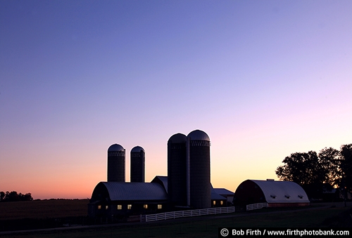 rural;country;agriculture;agricultural;farm buildings;silo;silhouette;dairy farm;barn;farm;summer;sunrise;trees;twilight;peaceful;predawn;WI;Wisconsin