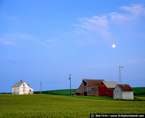 Barns;agriculture;country;farm;farm buildings;rural;midwest farm;summer;red barn;wood barn;windmill;moon;homestead;crops;farm field;farmstead