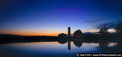 rural;country;agriculture;agricultural;farm buildings;barn;silhouette;silo;sunset;trees;twilight;after glow;evening sky;homestead;peaceful;pond;reflections in water;WI;Wisconsin;lake;predawn;sunrise