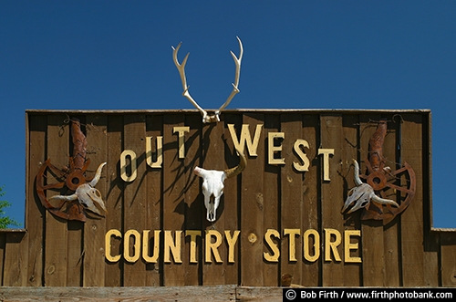 wall sign;wall art;tourism;South Dakota;skull;signage;SD;informational sign;horns;destination;country;building;Black Hills