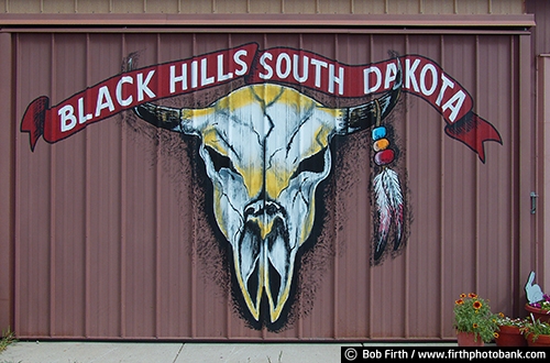 wall sign;wall art;tourism;South Dakota;skull;signage;SD;informational sign;horns;destination;building;Black Hills