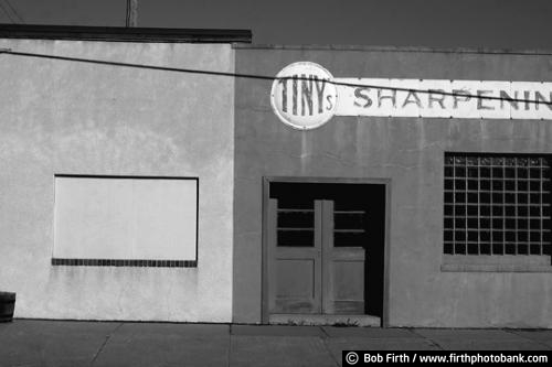 black and white photo;hand painted;old building;business store front;sign;signage;Minnesota;MN;window