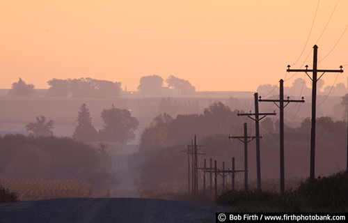 Wisconsin;WI;sunrise;silhouette;summer;rural;road;predawn;hills;fog;country;agriculture;telephone poles