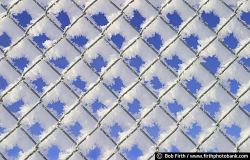 Bob Firth;photos;chain link fence;frost;frost covered fence;blue sky;winter;snow covered fence;Minnesota;patterns;repetition