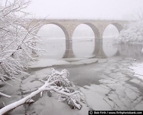 JJ Hill Bridge,James J Hill,Mpls,Minneapolis,MN,Minnesota,winter,snow,Mississippi River,trees,ice,white sky,reflections,water