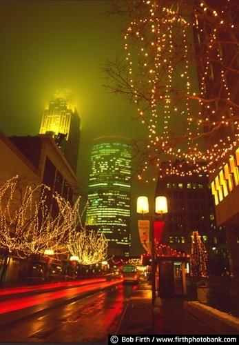 Nicollet Mall,Mpls,Minneapolis,MN,Minnesota,Christmas lights,decorations,night,buildings,IDS,Wells Fargo Center,city street scene,fog,nighttime,winter