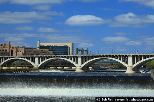 blue sky;buildings;Central Avenue Bridge;clouds;dam;daytime;Federal Reserve Bank;JJ Hill Bridge;Minneapolis;Minnesota;Mississippi River;MN;Mpls;Third Avenue Bridge;water;Twin Cities