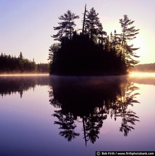 BWCAW;Boundary Waters;Boundary Waters Canoe Area Wilderness;Minnesota;sunrises;island;trees;reflections;water;lakes;wilderness;moody;peaceful;tranquil;solitary;solitude;misty;BWCA;MN