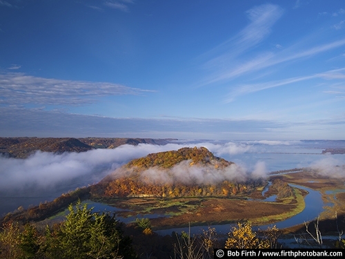 upper Mississippi River;Mississippi River;Mighty Mississippi;Great River Road;Wisconsin;WI;autumn;bluff country;bluffs;clouds;Mt Trempealeau;woods;woodlands;water;trees;explore;fall;fall color;fog;inspirational;island;backwater;Perrot State Park;quiet water;Trempealeau National Wildlife Refuge;Trempealeau River;Trempealeau WI;Wisconsin State Park;overview;solitude;tranquil;vista;aerial view;river bluffs;western Wisconsin