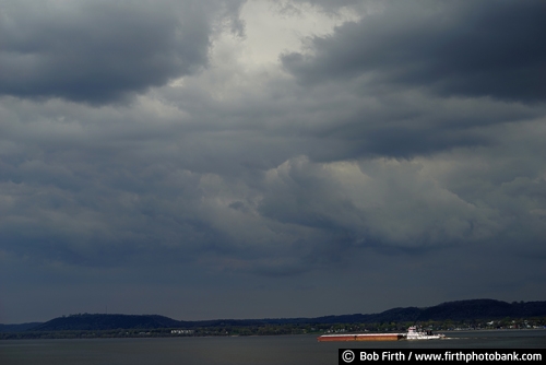 tug boat;threatening sky;spring;storm clouds;Mississippi River;Mighty Mississippi;Great River Road;boat;bluffs;barge;Lake Pepin