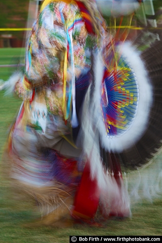 Native Americans;Native American Indians;Native American clothing;Pow Wow;cultural;culture;dancing;dancer;Indian dancers;dancing abstract;dancing motion;powwaw;social gathering;regalia;authentic design;tradition;customs;Native American Indians customs;traditional;traditional ceremonies;Wacipi;American Indian gathering;celebration of life;man;feathers;feather bustle;feathers used by Indians;feathers used in regalia;eagle feathers;eagle feathers used on Native American regalia