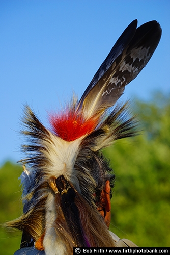 Native Americans;Native American Indians;Native American clothing;man;Pow Wow;cultural;culture;powwaw;social gathering;regalia;authentic design;tradition;customs;traditional;traditional ceremonies;tribes;Wacipi;American Indian gathering;celebration of life;feather headdress;feathers;feathers used in regalia;feathers used by Indians