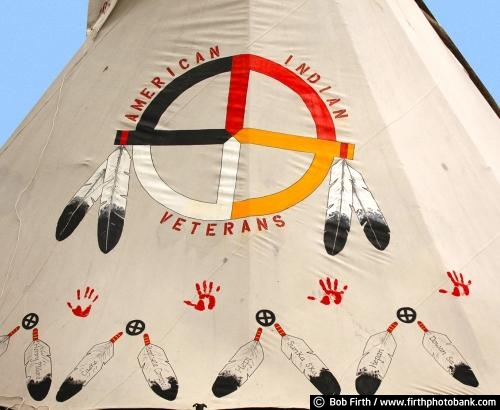 Native Americans;cultural;culture;authentic design;teepee;a cone shaped tent;a Native American tent;a portable structure;teepees;tepee;tipi;traditionally made of animal skins upon wooden poles;tradition;customs;Native American Indians customs;traditional;American Indian Veterans teepee;teepee artwork;teepee detail;circle of life;circle of life symbolism;symbolic;Native American art