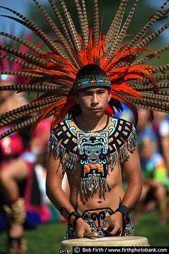 Aztec;South America;South American Indians;central mexico;Aztec drummer;Aztec man;Pow Wow;celebration of life;tradition;customs;traditional;traditional ceremonies;tribes;Wacipi;regalia;authentic design;social gathering;powwaw;cultural;culture;people;feathers;colorful feathers;eagle feathers used on Native American regalia;feather headdress;feathers used by Indians;feathers used in regalia;pheasant feathers;pheasant feathers for Aztec regalia;man;Native American Indians;drumming;drum music;Native Americans;Native American music