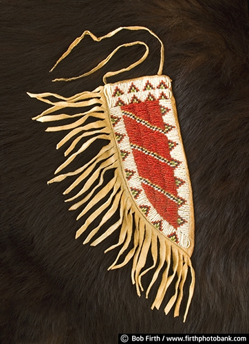 beaded knife sheath;Native Americans;beads;beaded patterns;beadwork;colorful beads;Native American art;Native American Indians;cultural;Sioux;knife sheath;leather;buckskin;Sioux artwork;traditional;tradition;beaver hide