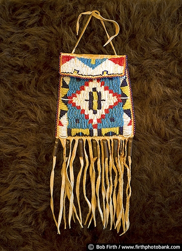 beaded tabacco bag;Native Americans;beads;beaded patterns;beadwork;beadwork on bag;colorful beads;Dakota;tabacco bag;Dakota Indians;buffalo hide;bison hide;Native American art;Native American Indians;cultural;leather;buckskin;traditional;tradition