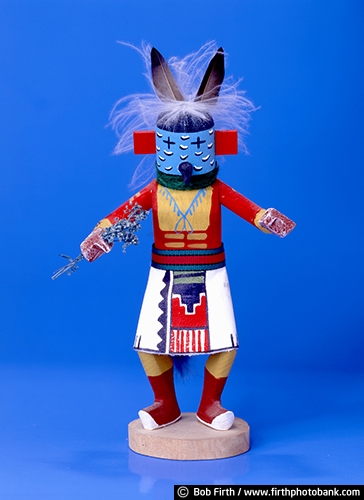 Kachina doll;Hopi katsina figure;wood carving;tithu;katsintithu;made by Hopi people;figures carved from cottonwood root;immortal messengers between humans and the spirit world;Hopi people;Northeastern Arizona;ceremonial figure;purpose to instruct young girls and new brides;immortal beings that bring rain and control the natural world and society;Native American art;Native American Indians;cultural;culture;tradition;traditional