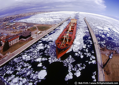 biggest fresh water lake;aerial view of Duluth;boats;destination;Aerial Lift Bridge;Great Lakes;ice;Kitchi Gammi;Lake Superior;largest freshwater lake;Minnesota;MN;North Shore;ship;tourism;winter;overview