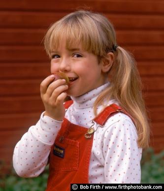 child;girl;apple;red barn;overalls;Minnesota;healthy food;MN