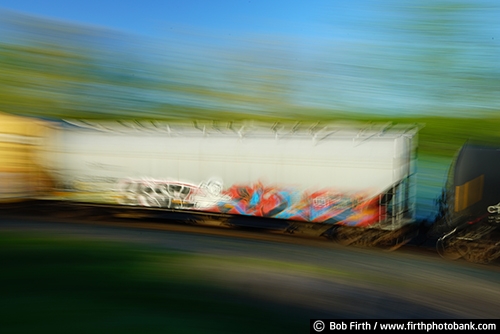 Railroad;industry;abstract;blur;motion;train in motion;rail cars;shipping;train;train cars;transportation;railcars