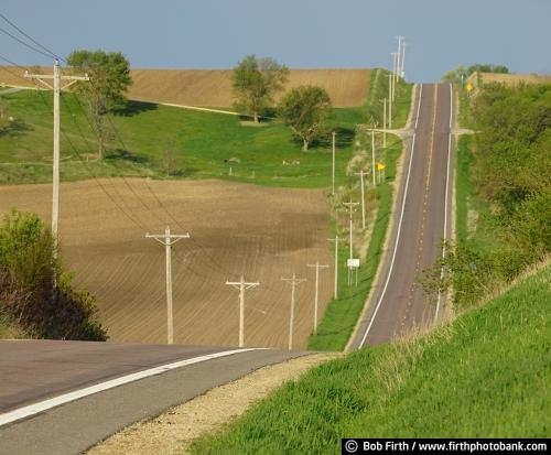 Roads;2 lane road;country;country road;hilly road;Minnesota;MN;paved road;rural;spring;telephone poles;two lane road;deserted road