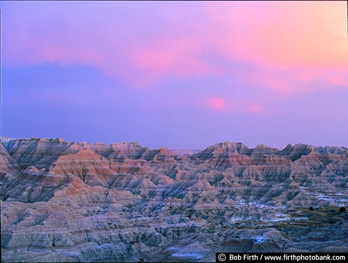 Badlands National Park SD;tourism;southwestern South Dakota;solitude;destination;erosion;rugged;geologic deposits;mixed grass prairie;sharply eroded buttes;sunset