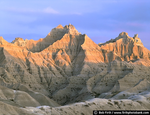 Badlands National Park SD;tourism;southwestern South Dakota;solitude;destination;erosion;rugged;geologic deposits;mixed grass prairie;sharply eroded buttes;sunrise