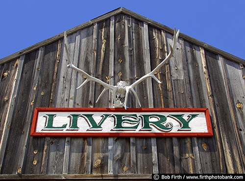 1880 Ghost Town;Midland SD;old building;South Dakota;weathering;weathered;tourism;country;destination;rural;advertising;business sign;store ;Livery