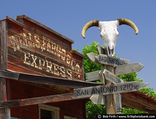 1880 Ghost Town;country;cow skull;destination;directional sign;historic;Midland SD;old building;rural;South Dakota;tourism;Wells Fargo Building;horns;weathering;weathered;advertising;business sign;store 