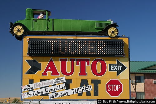 signage;SD;South Dakota;directional sign;business sign;automobile;car sign;advertising;close up;details