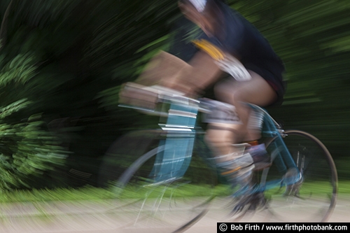 exercise;Bicycling;action shot;bicycle;bike;biker;biking;blur;close up;cycling;cyclist;fast;motion;pedaling;road bike;racing;race;road race;sport