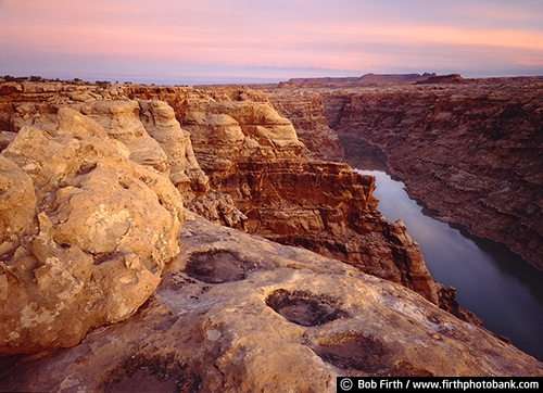 Browns Rim;located in the Glen Canyon National Recreation Area;named after explorer John Wesley Powell;reservoir on the Colorado River;straddles the border between southern Utah and northern Arizona;UT;Native American archeological sites;Utah;Colorado River;Native American corn grinding holes in rock