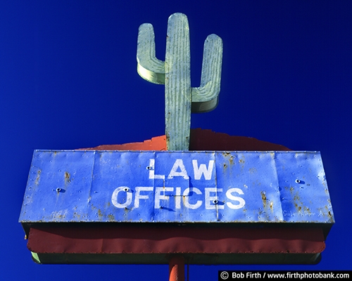 cactus;advertising;blue sky;business;law office;metal;old signs;rusting;rusty;signage;southwest;post;western