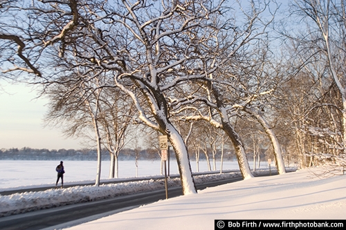 destination;frozen lakes;jogging;Lake Harriet;Minneapolis;Minnesota;MN;Mpls;runner;roads;running;snow;snow covered trees;trails;walking path;winter;tourism;Twin Cities