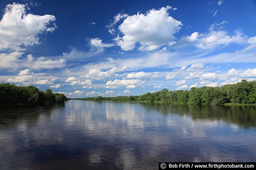 Chippewa River;blue sky;Wisconsin;WI;white puffy clouds;summer;reflections in water;trees