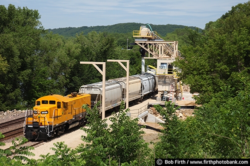 frac sand mining;frac sand processing plant;hydraulic fracturing;processing facility;river bluffs;silica sand mining;summer;trees;Wisconsin;Maiden Rock WI;Mississippi River area;train;bluffs